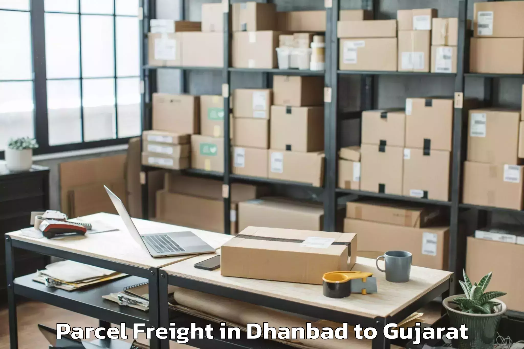 Quality Dhanbad to Vansada Parcel Freight